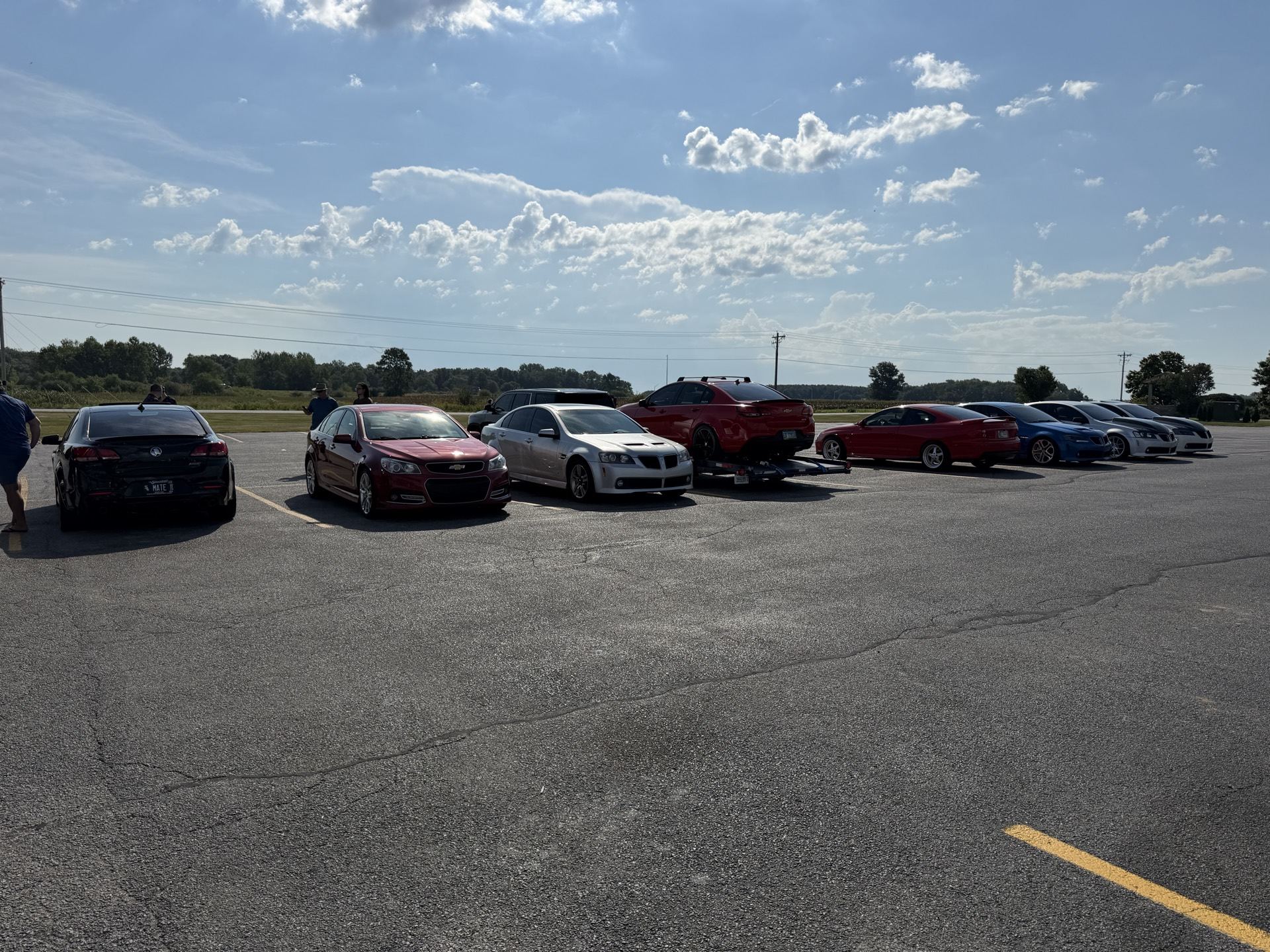 Rows of Holden Commodores and Chevy SS sedans parked at Indianapolis Motor Speedway